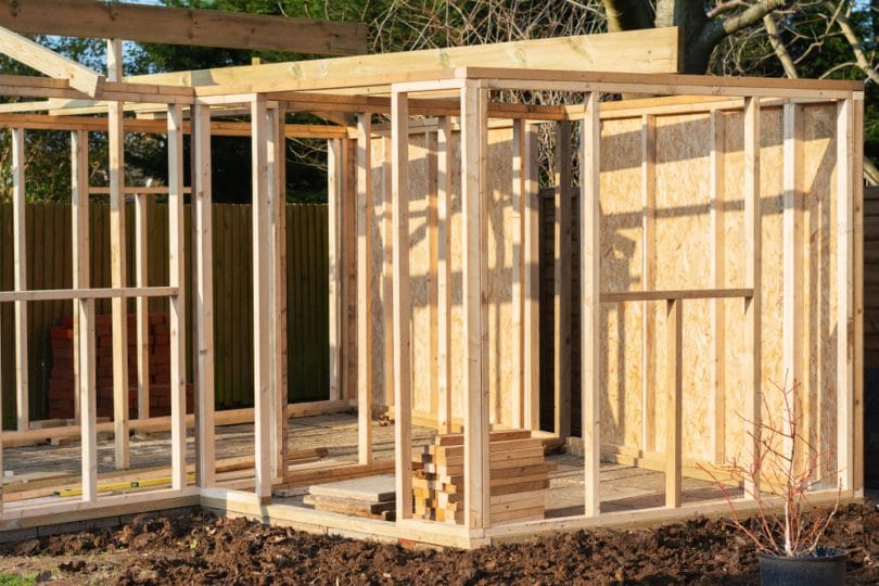 I bought an old boat shed and transformed it into my dream home with my kids – our outdoor bathroom gives vacation vibes