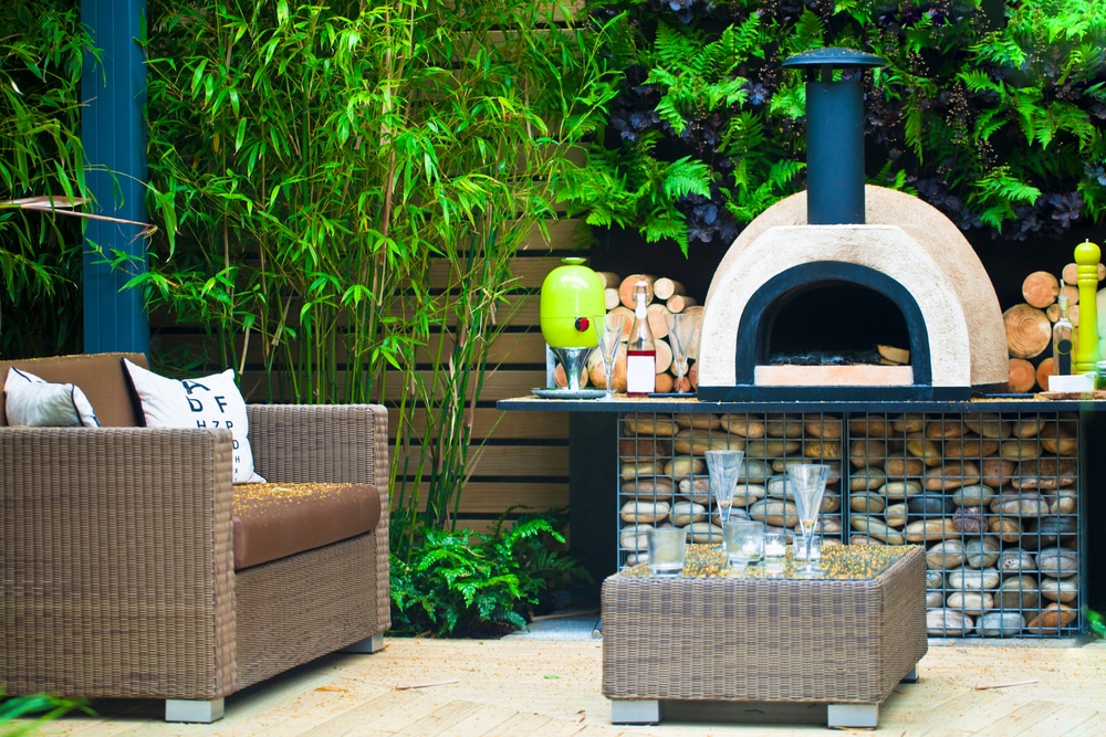a wood fired pizza oven in a garden